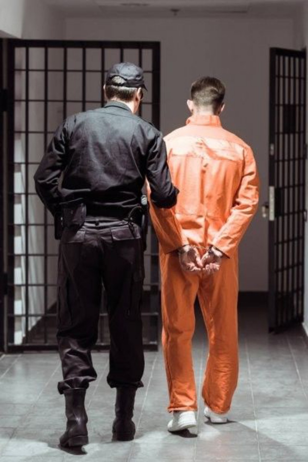 A prisoner escorted into prison